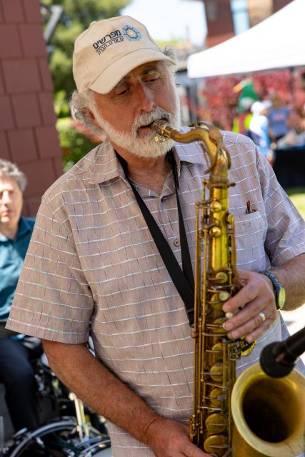A saxophonist playing at Epicura Village